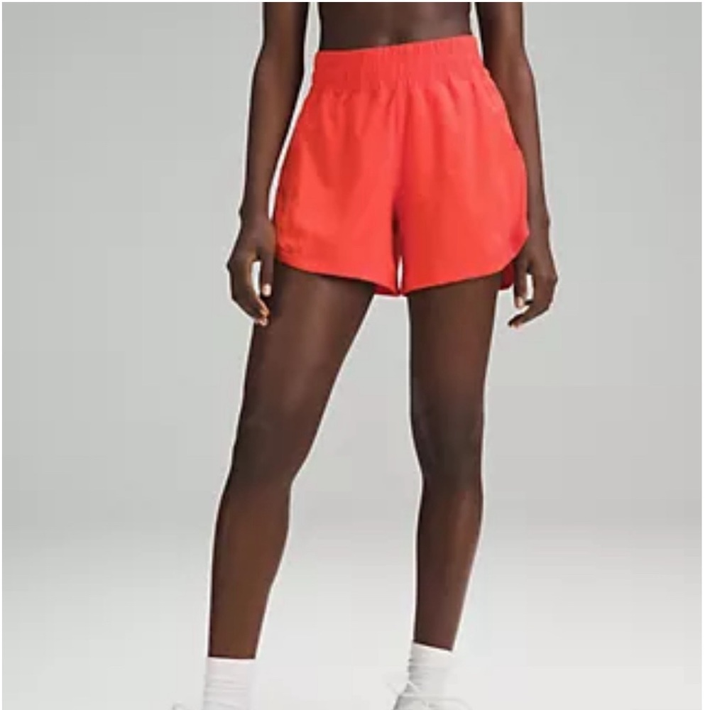 Lululemon track that high rise lined short 5” size 4 solar orange